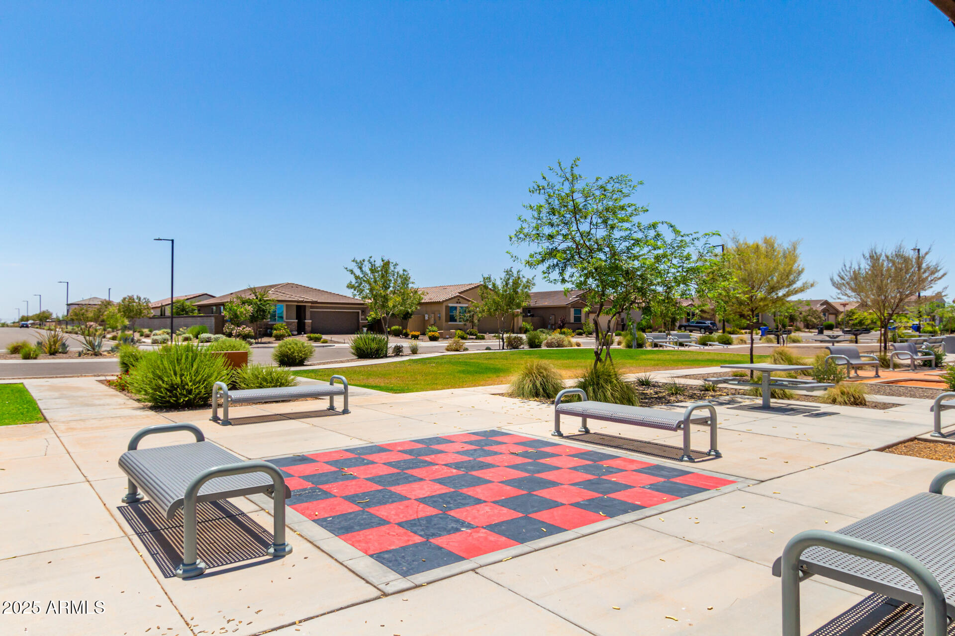 17320 West Daley Lane Surprise, AZ 85387 - Photo 38 of 46 a view of swimming pool with outdoor seating and plants