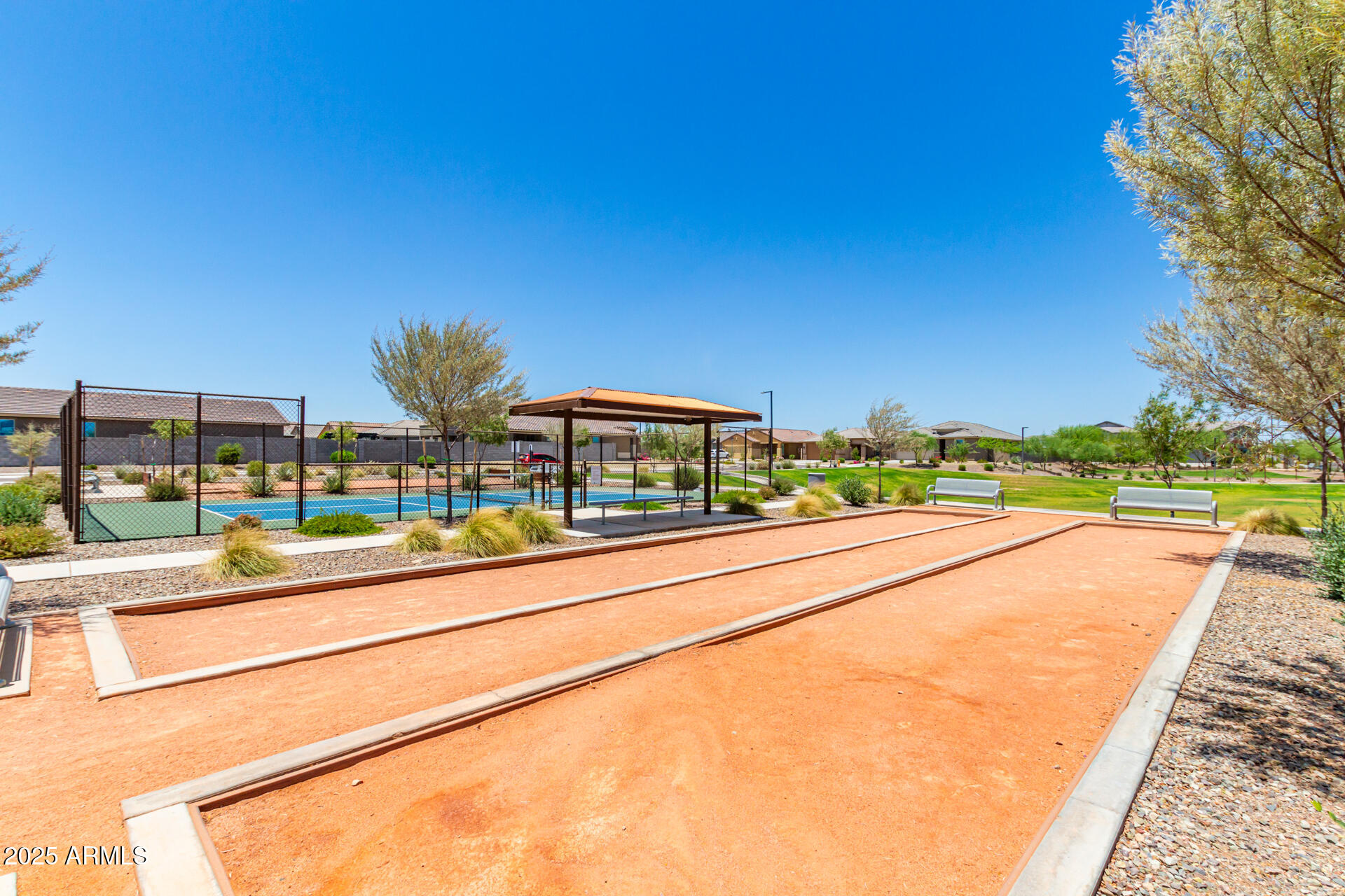 17320 West Daley Lane Surprise, AZ 85387 - Photo 39 of 46 a view of swimming pool with outdoor seating and city view