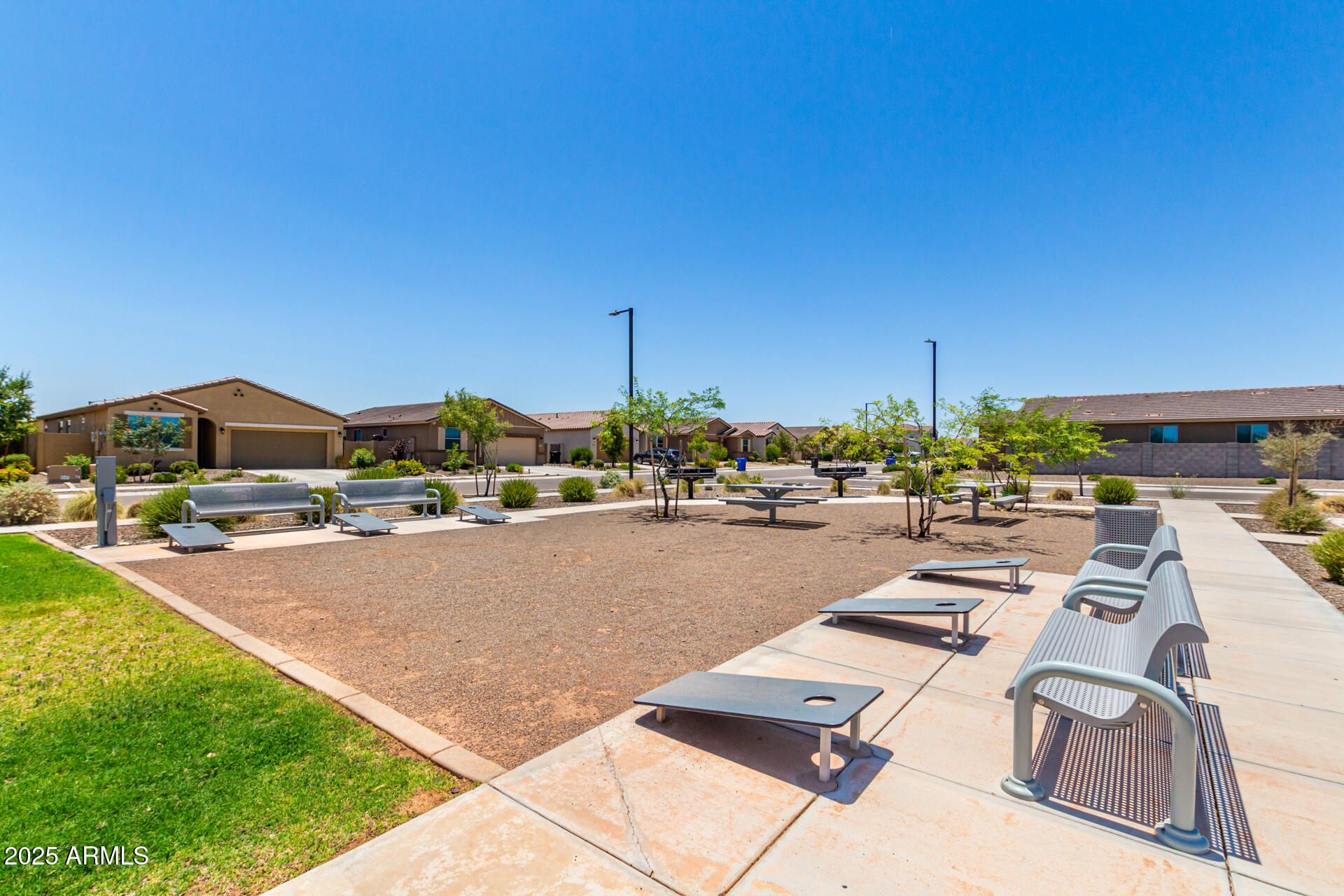 17320 West Daley Lane Surprise, AZ 85387 - Photo 40 of 46 a view of swimming pool outdoor seating area and barbeque oven