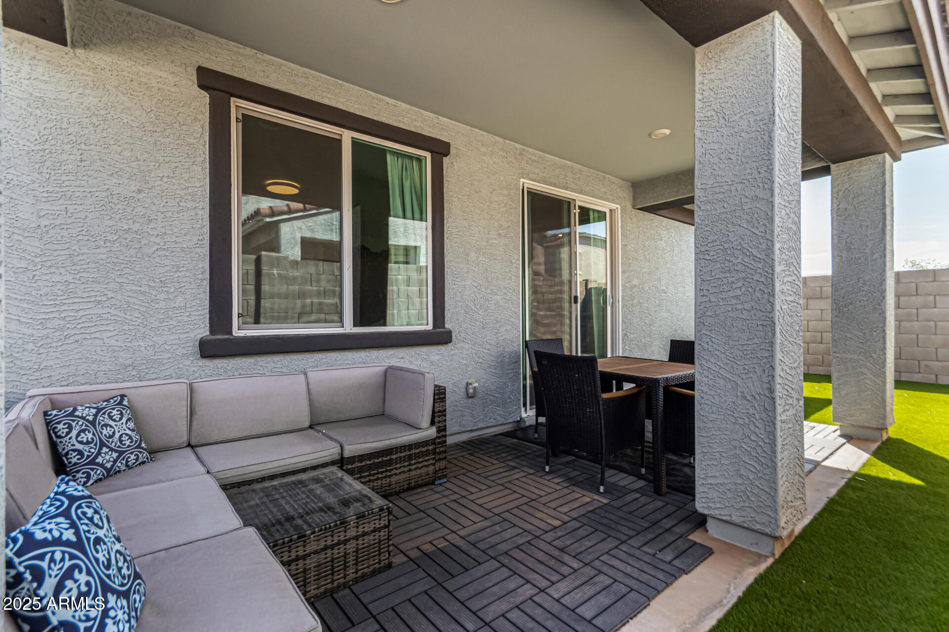 17320 West Daley Lane Surprise, AZ 85387 - Photo 8 of 46 a living room with furniture and a window