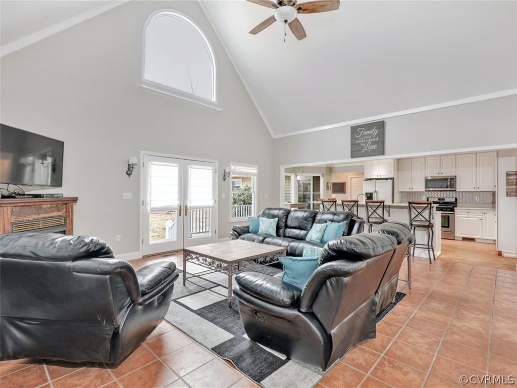 2932 Roundabout Road Louisa, VA 23093 - Photo 11 of 36 Family room with tile flooring, vaulted ceiling, f