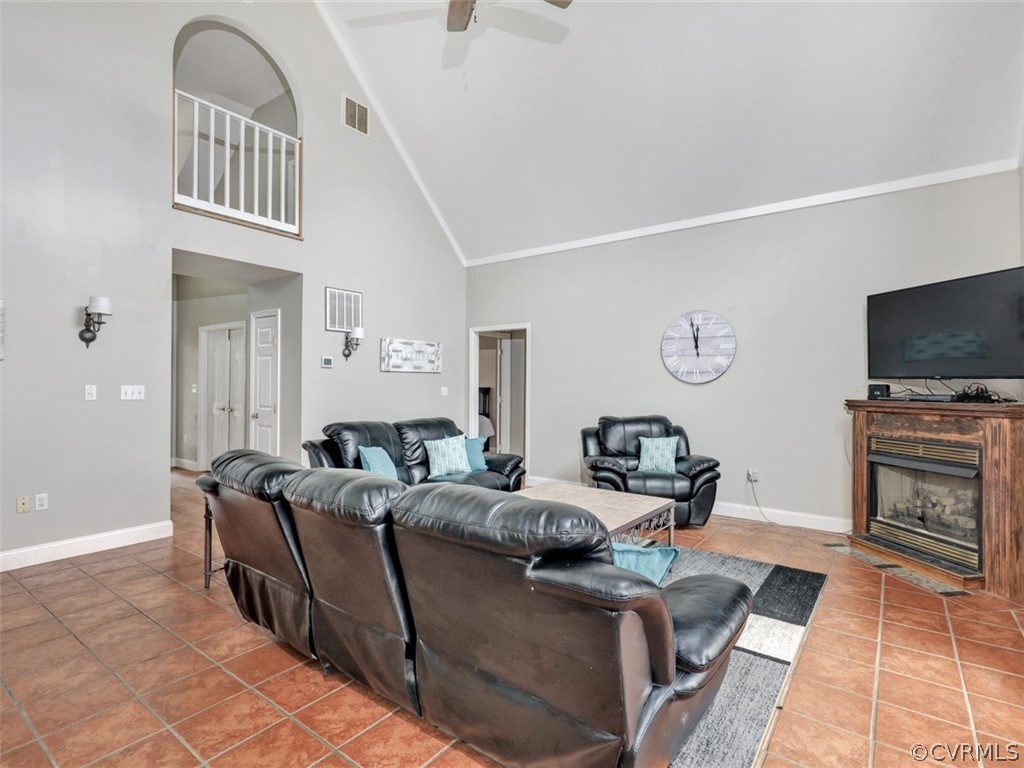 2932 Roundabout Road Louisa, VA 23093 - Photo 12 of 36 Family room with tile flooring, vaulted ceiling, f