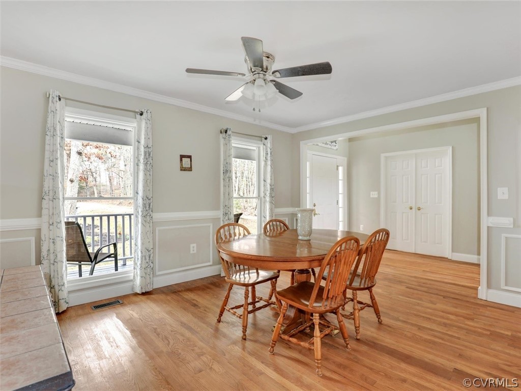 2932 Roundabout Road Louisa, VA 23093 - Photo 16 of 36 Dining room with Hardwood Floors, crown/chair mold