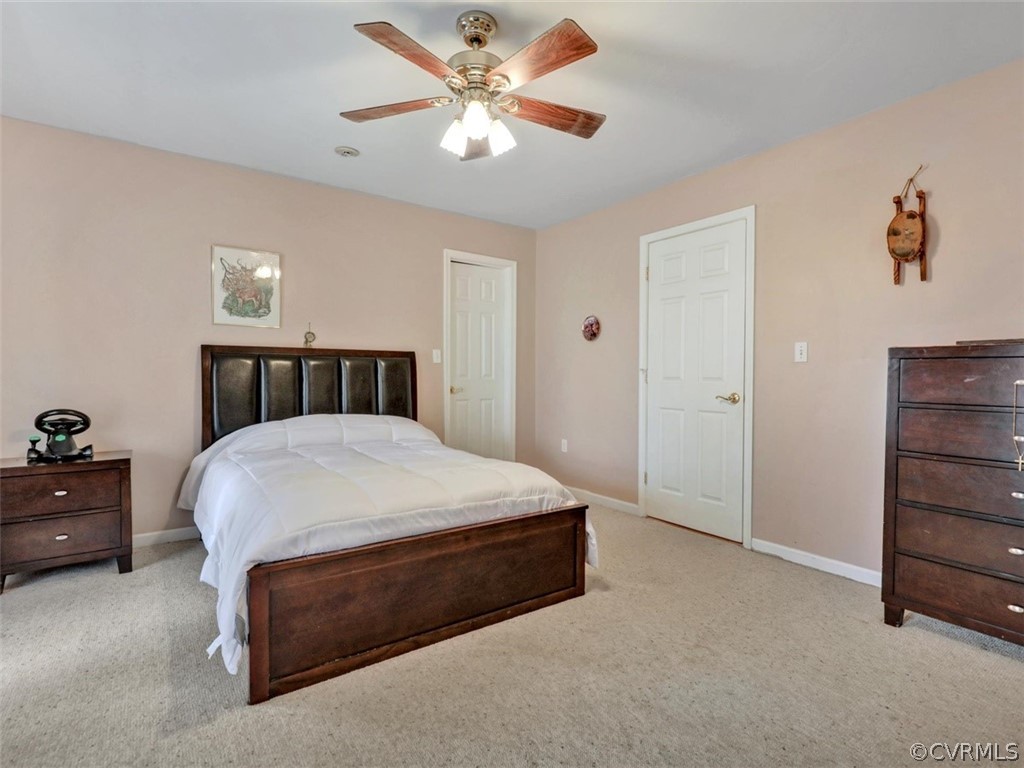 2932 Roundabout Road Louisa, VA 23093 - Photo 21 of 36 Bedroom #2 with carpet, fan/light fixture and walk