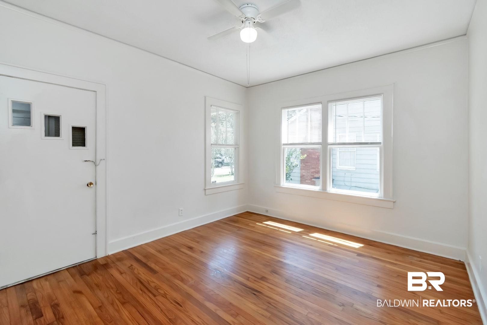 112 South Fulton Street Mobile, AL 36606 - Photo 26 of 35 Unfurnished room featuring hardwood / wood-style floors and ceiling fan