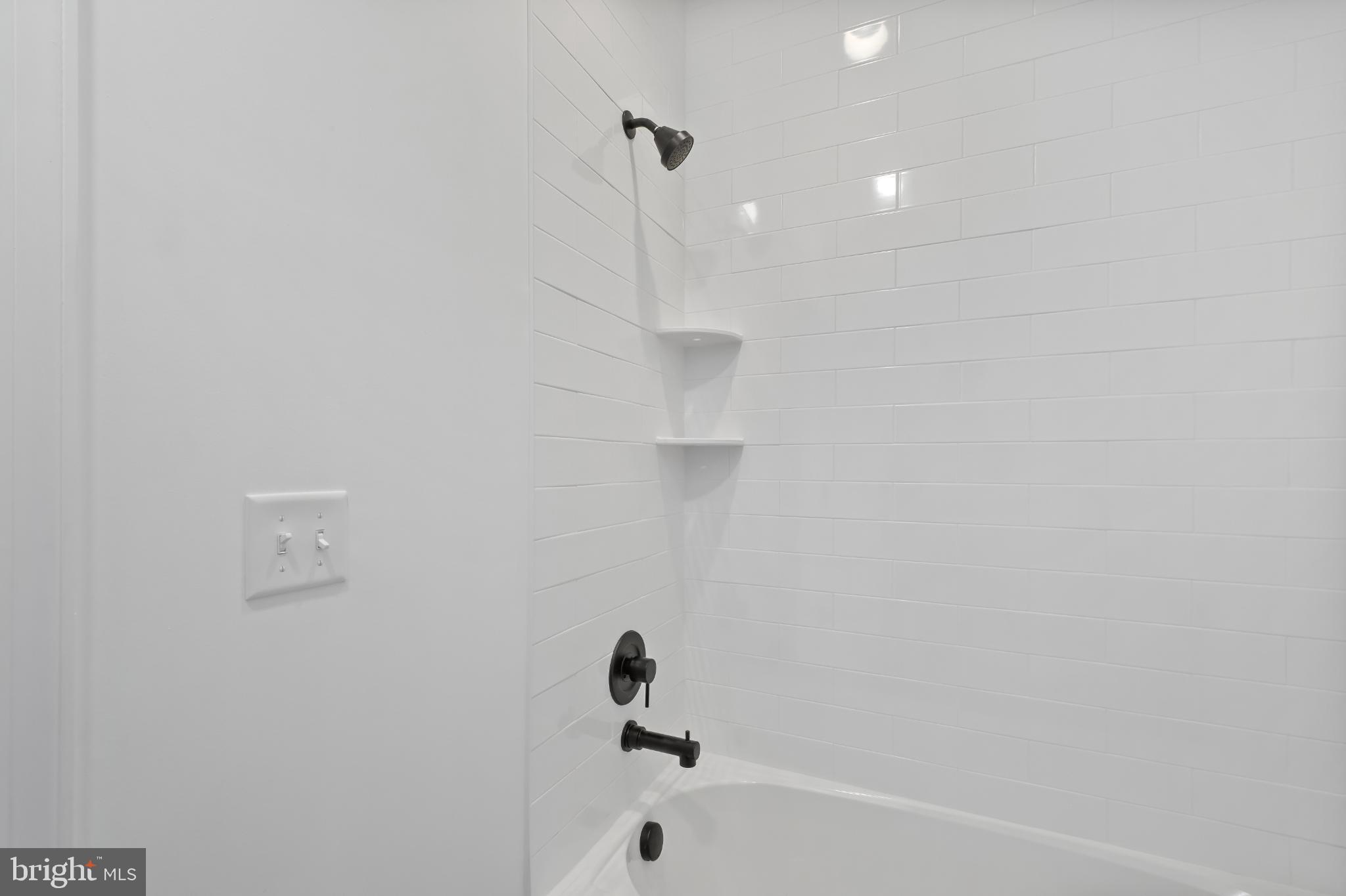 28272 Riverside Drive Salisbury, MD 21801 - Photo 16 of 33 Sleek, modern bathroom with elegant fixtures.