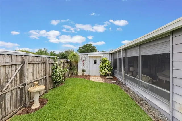 a view of a backyard with garden
