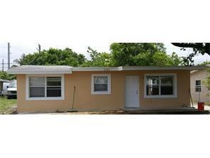 2180 Northwest 3rd Street Pompano Beach, FL 33069 - Photo 1 of 6 a black and white photo of a house