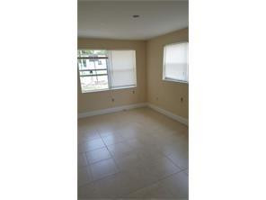 2180 Northwest 3rd Street Pompano Beach, FL 33069 - Photo 5 of 6 a view of an empty room with a window
