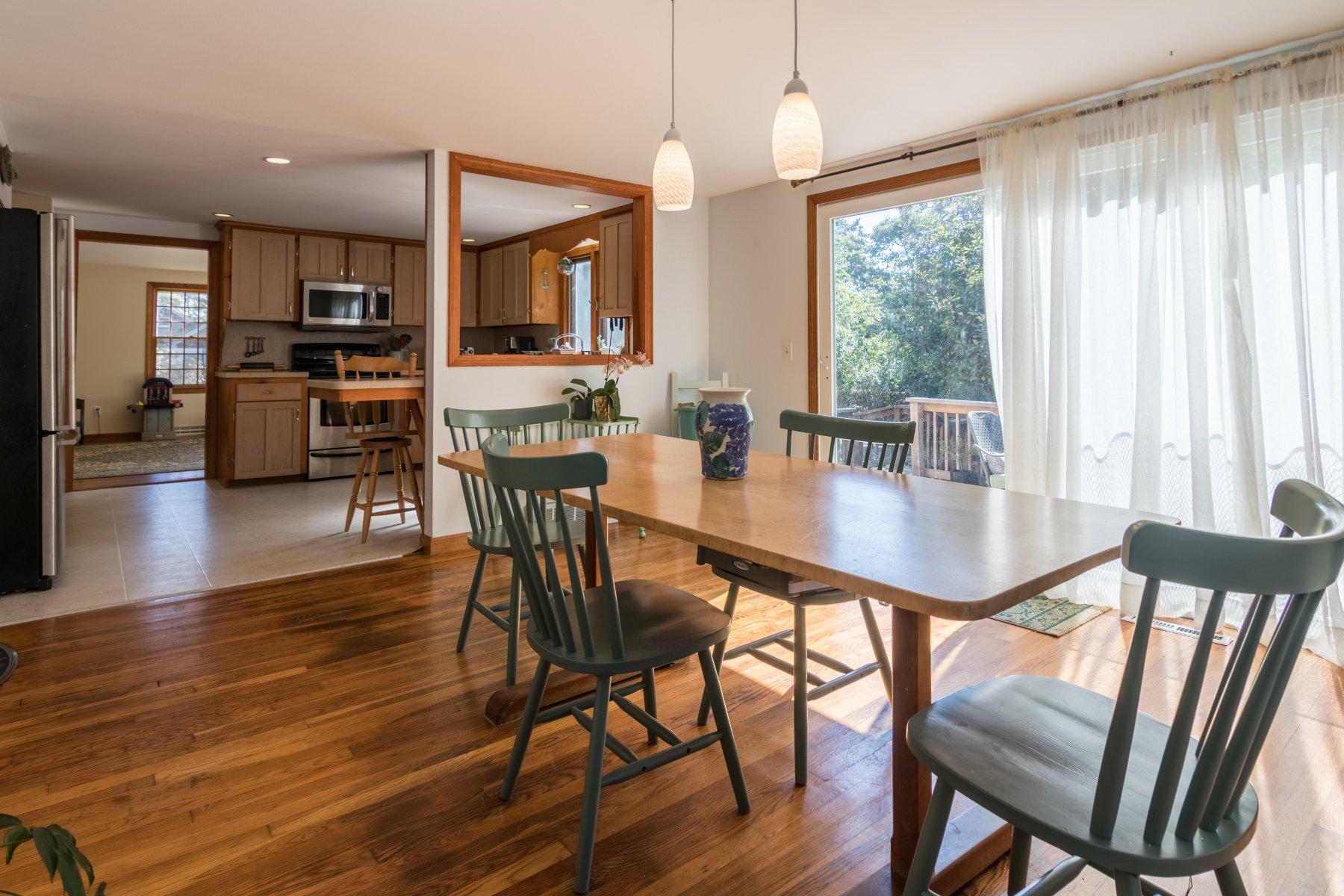 247 Chatham Road Harwich, MA 02645 - Photo 11 of 33 a dining room with furniture window wooden floor