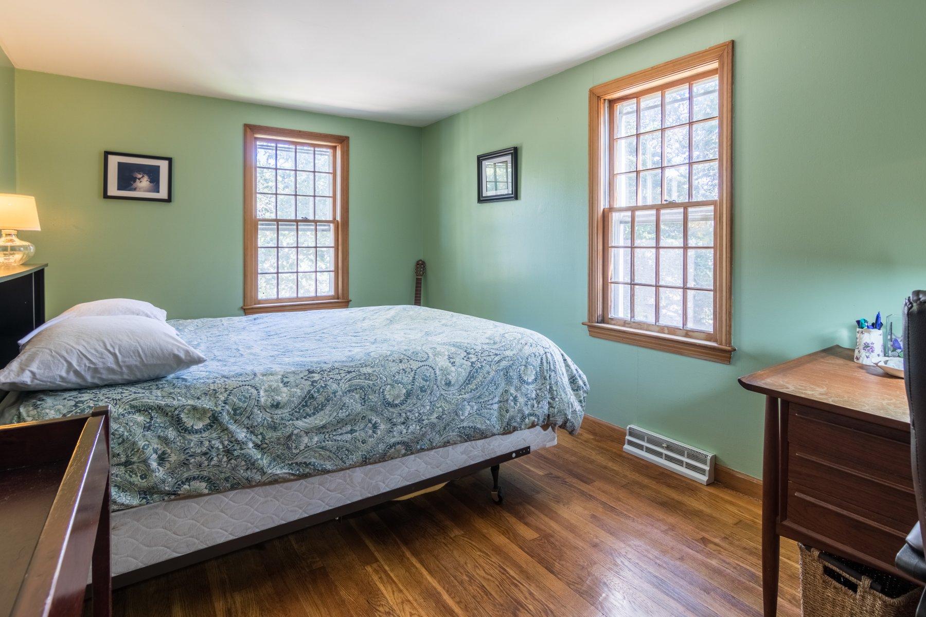 247 Chatham Road Harwich, MA 02645 - Photo 21 of 33 a bedroom with a bed and a window