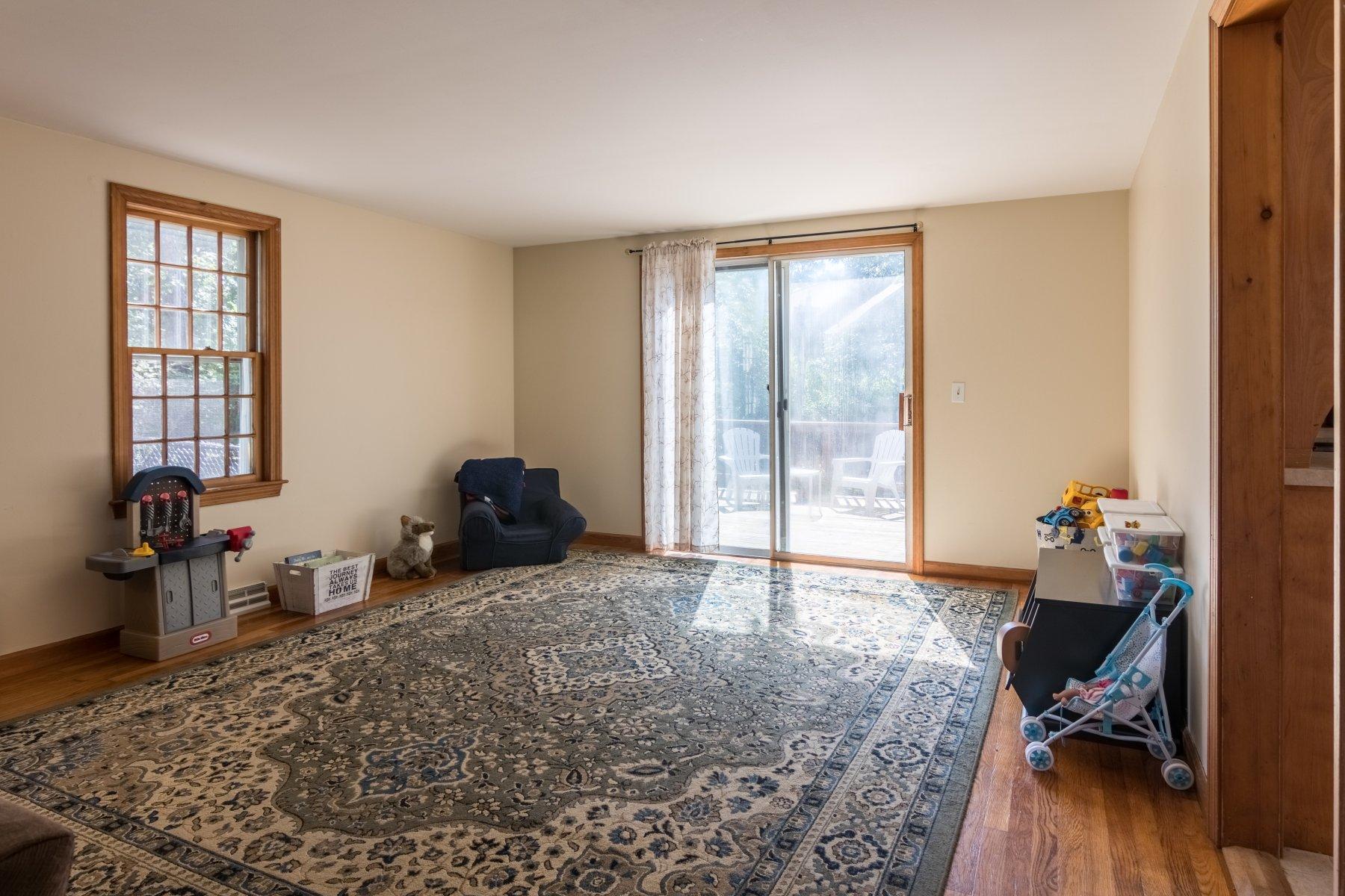 247 Chatham Road Harwich, MA 02645 - Photo 9 of 33 a living room with furniture window and wooden floor