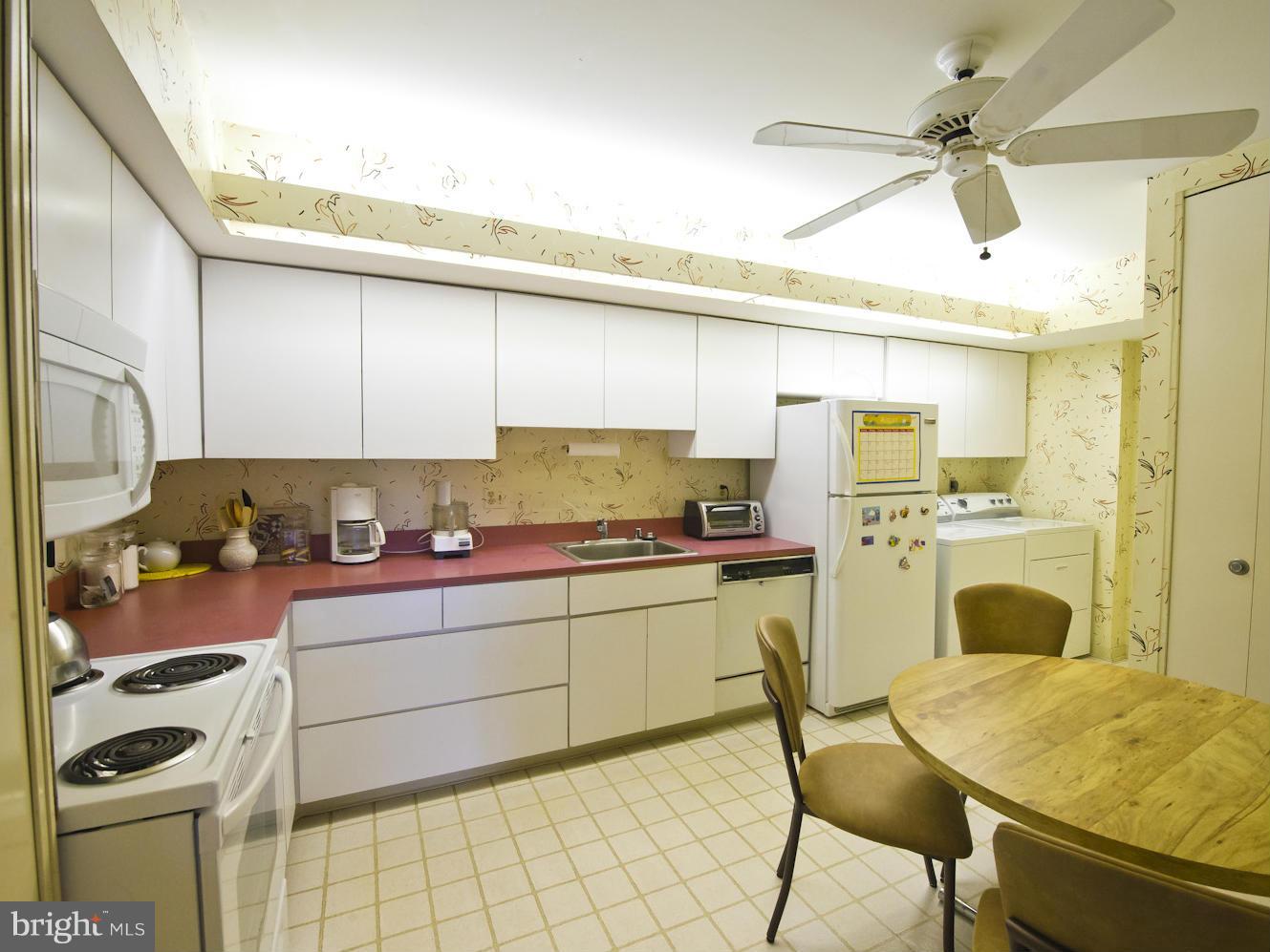 33 Stonehenge Circle, Unit 11 Baltimore, MD 21208 - Photo 18 of 21 Kitchen with Updated Cabinets