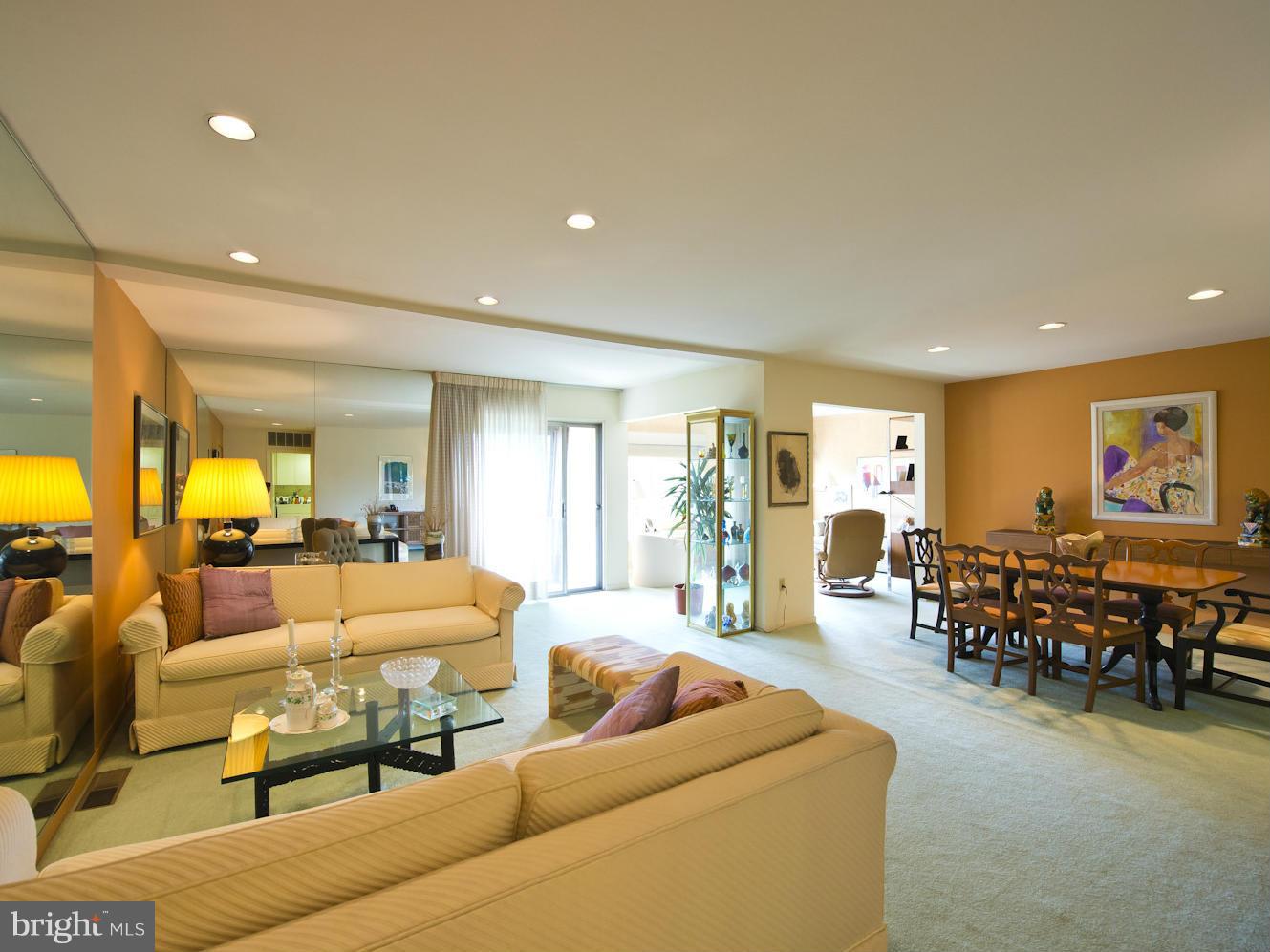 33 Stonehenge Circle, Unit 11 Baltimore, MD 21208 - Photo 5 of 21 LIVING ROOM, DINING ROOM and DEN