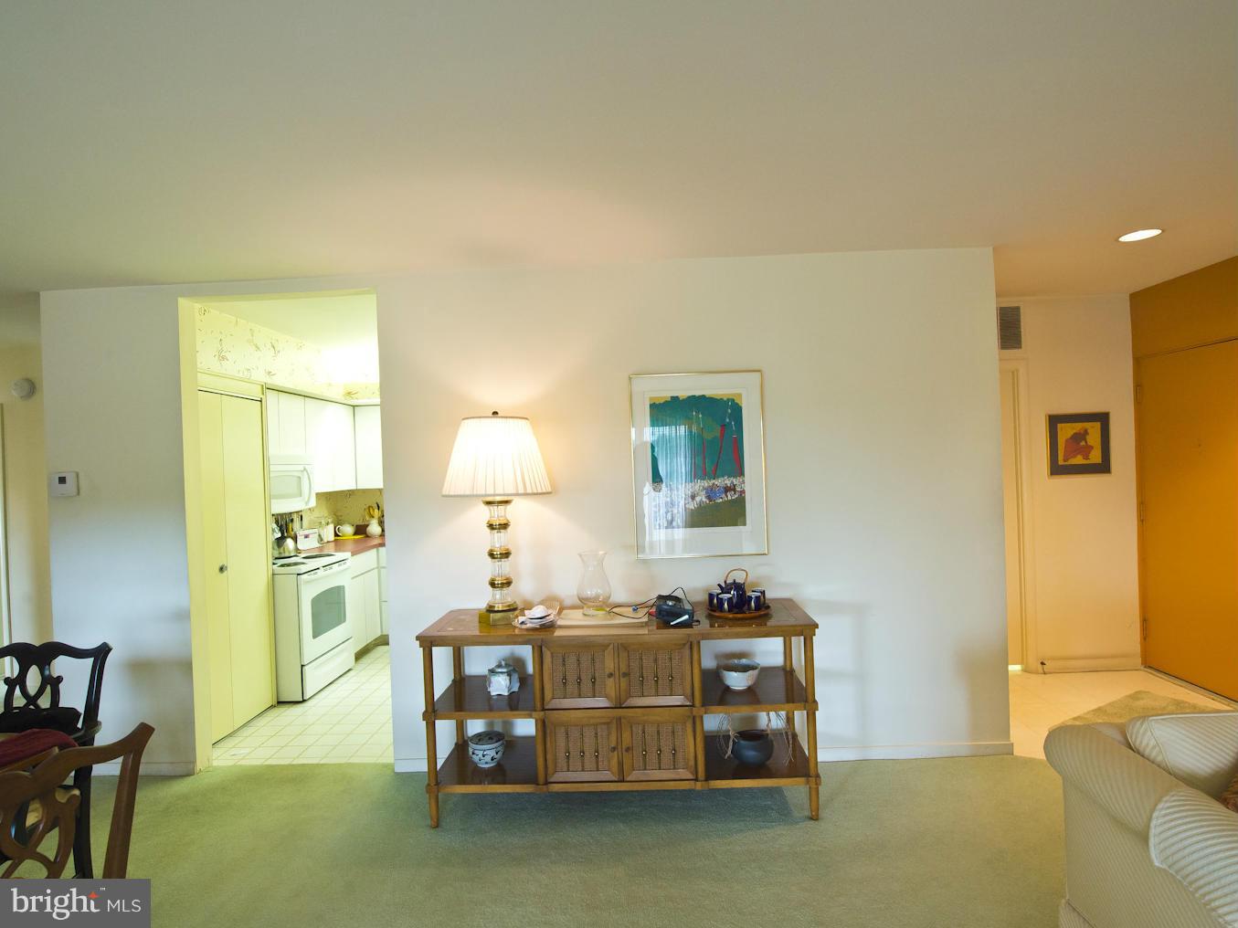 33 Stonehenge Circle, Unit 11 Baltimore, MD 21208 - Photo 6 of 21 Living Room Looking into Kitchen
