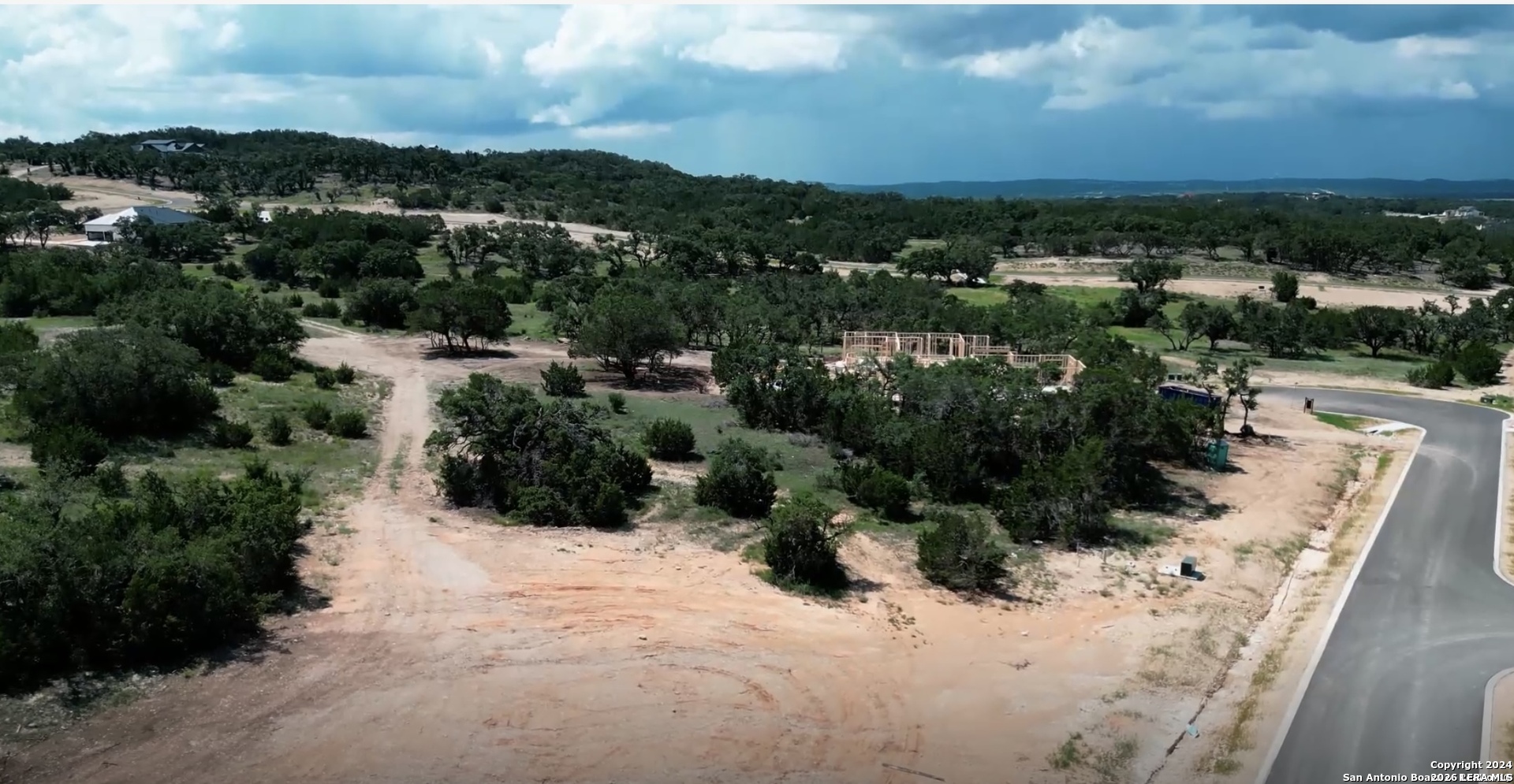 521 Rosemary Rdg Drive Bulverde, TX 78163 - Photo 2 of 4 a view of a lake with a city