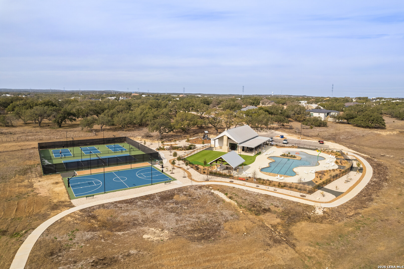 521 Rosemary Rdg Drive Bulverde, TX 78163 - Photo 30 of 32 a view of a swimming pool with an ocean view