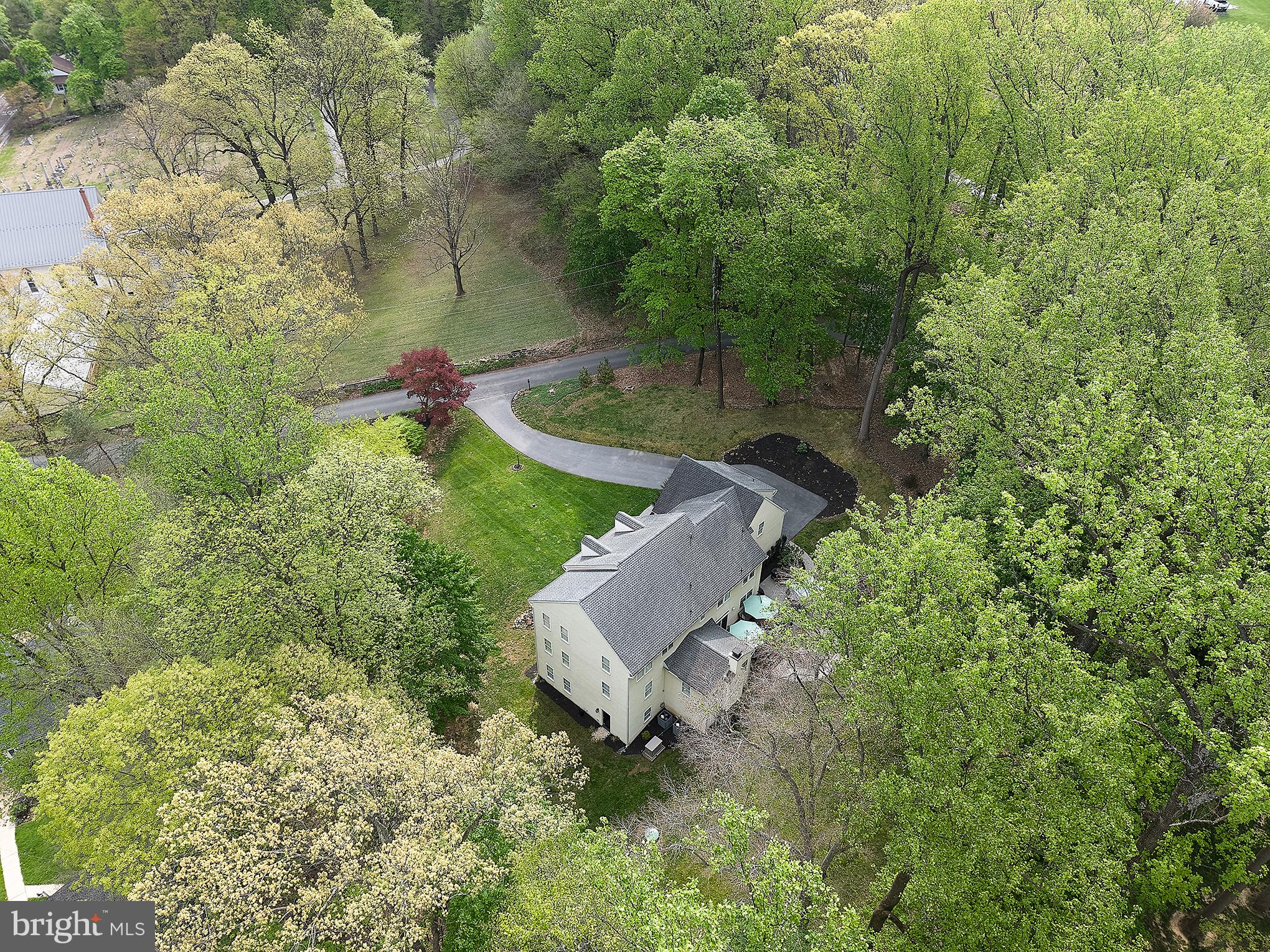 661 St Matthews Road Chester Springs, PA 19425 - Photo 62 of 64 Serene retreat amidst lush greenery.