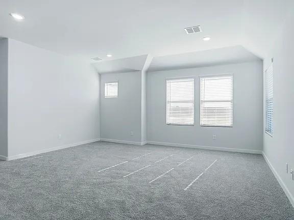641 Poppy Lane Lavon, TX 75166 - Photo 11 of 12 Unfurnished room featuring carpet flooring and recessed lighting