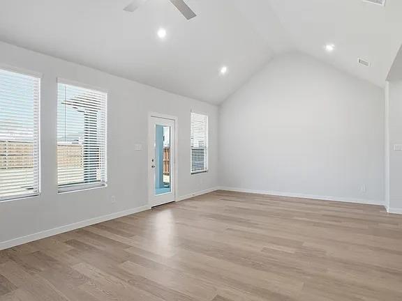 641 Poppy Lane Lavon, TX 75166 - Photo 3 of 12 Unfurnished room featuring light wood-style flooring, ceiling fan, and recessed lighting