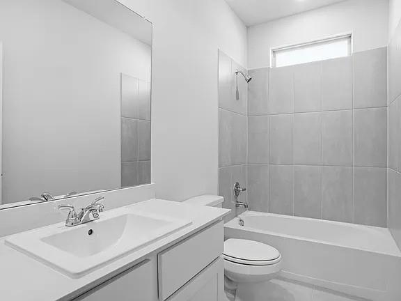 641 Poppy Lane Lavon, TX 75166 - Photo 5 of 12 Bathroom featuring vanity, shower / tub combination, and light tile patterned floors