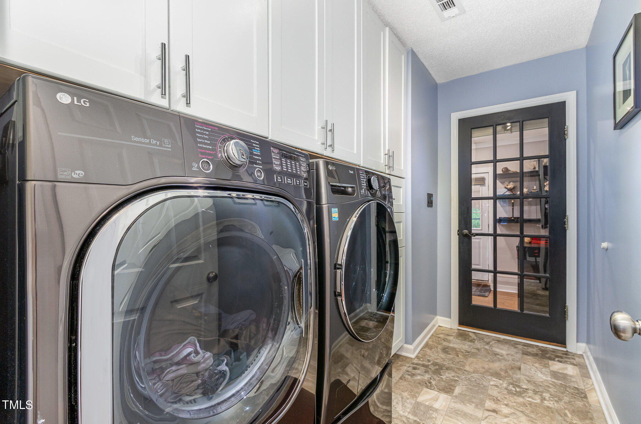4902 Valley Ridge Drive Durham, NC 27713 - Photo 16 of 28 Laundry Room French doors