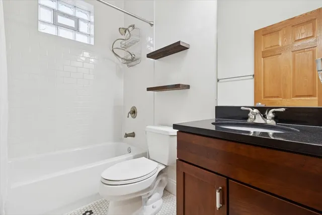 a view of a hallway with washer and dryer