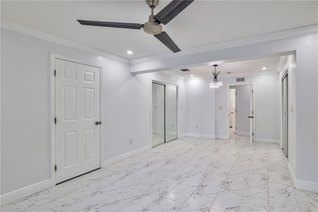 1389 West 33rd Street Riviera Beach, FL 33404 - Photo 11 of 20 a view of an empty room