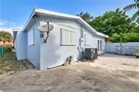 a view of a house with a patio