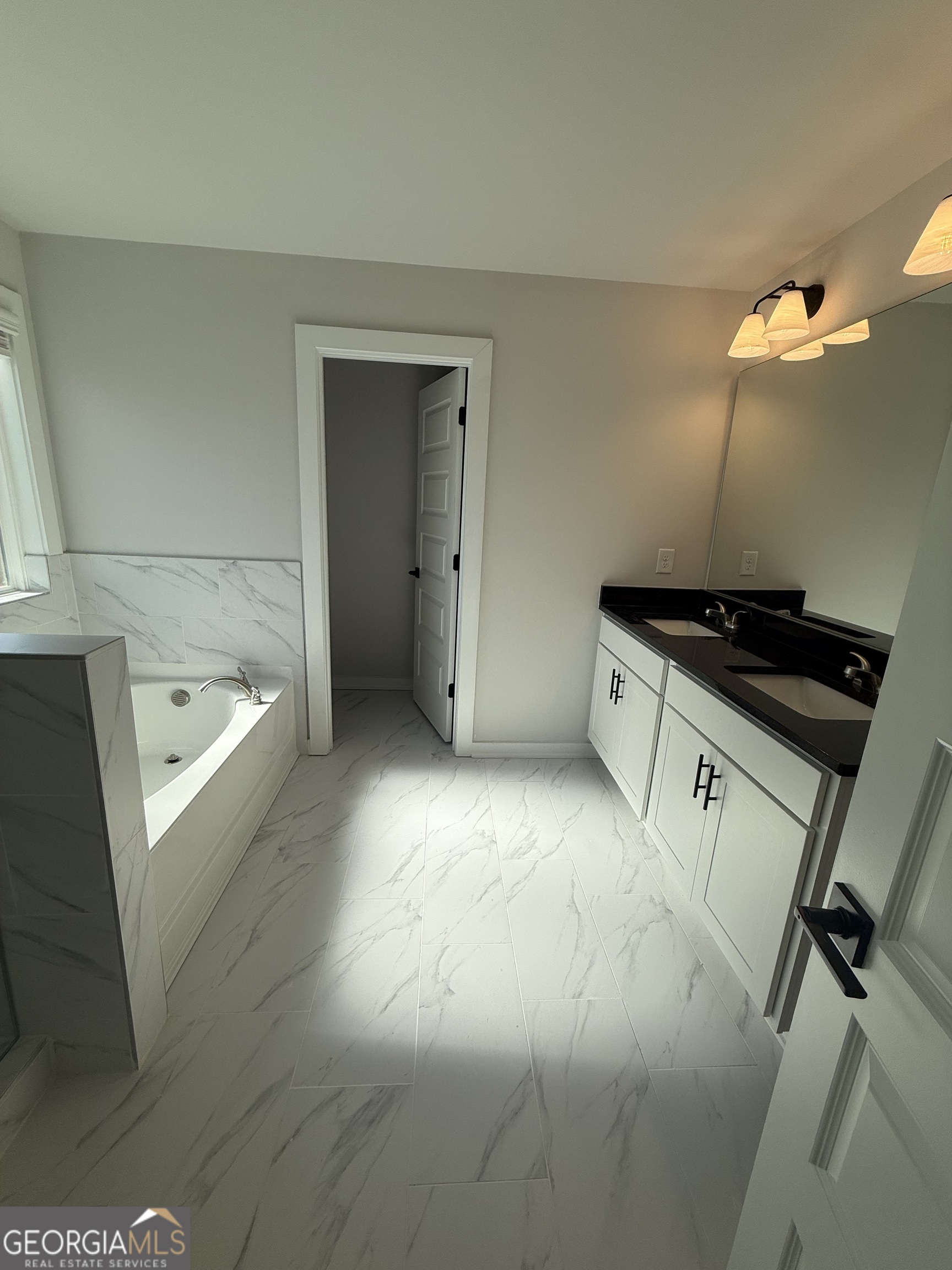 210 Villa Rica Springs Villa Rica, GA 30180 - Photo 17 of 24 a kitchen with a sink and cabinets