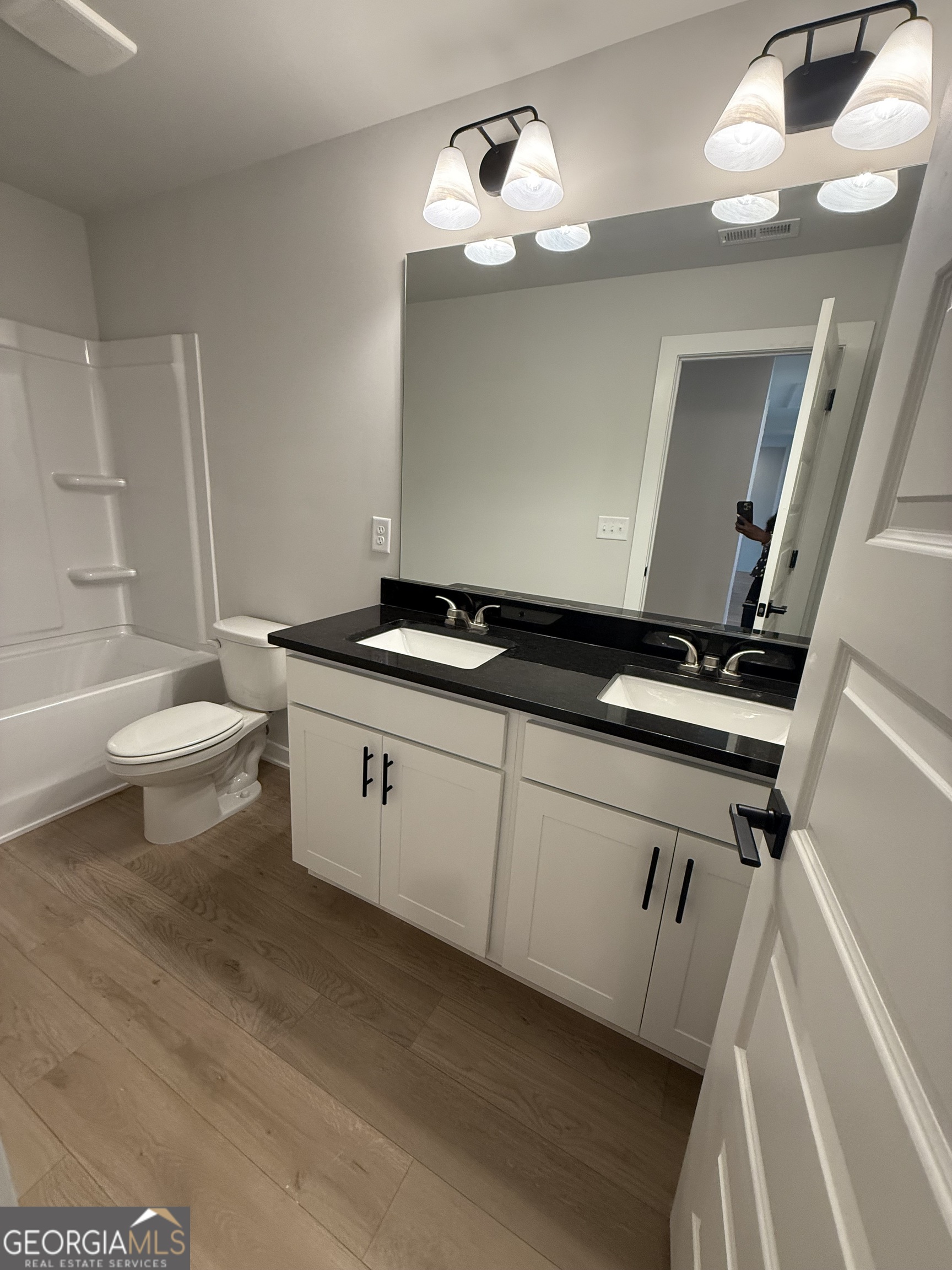 210 Villa Rica Springs Villa Rica, GA 30180 - Photo 24 of 24 a kitchen that has a sink and a stove