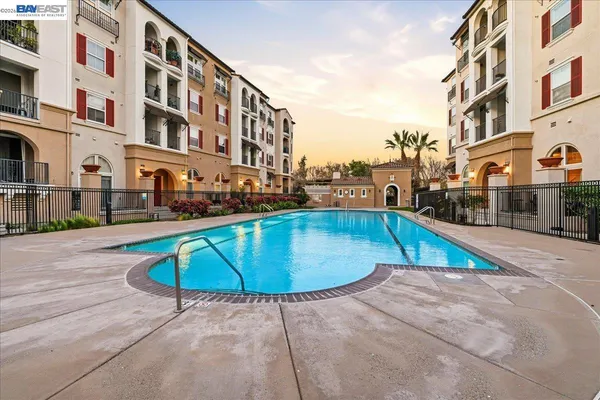 a view of a house with swimming pool
