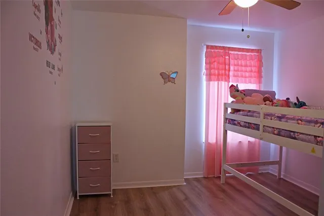 a view of a dresser with wooden floor