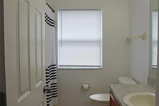 a bathroom with a sink and a toilet