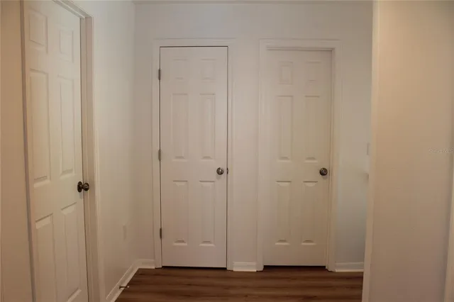 a view of small space with wooden floor