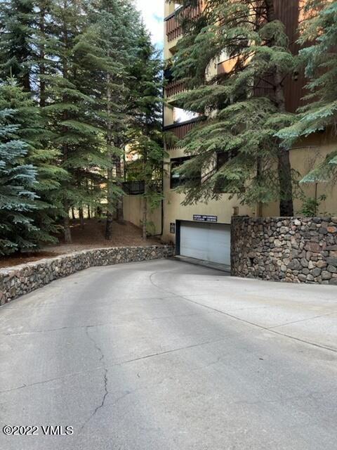 68 East Meadow Drive, Unit 726 Vail, CO 81657 - Photo 2 of 12 a view of a house with a tree