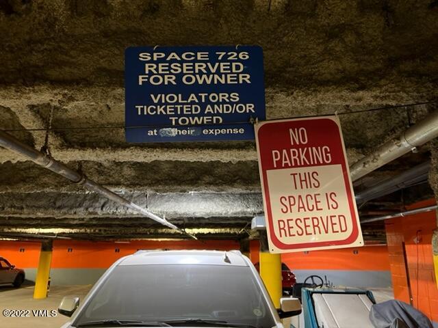 68 East Meadow Drive, Unit 726 Vail, CO 81657 - Photo 5 of 12 a street sign that is on a pole