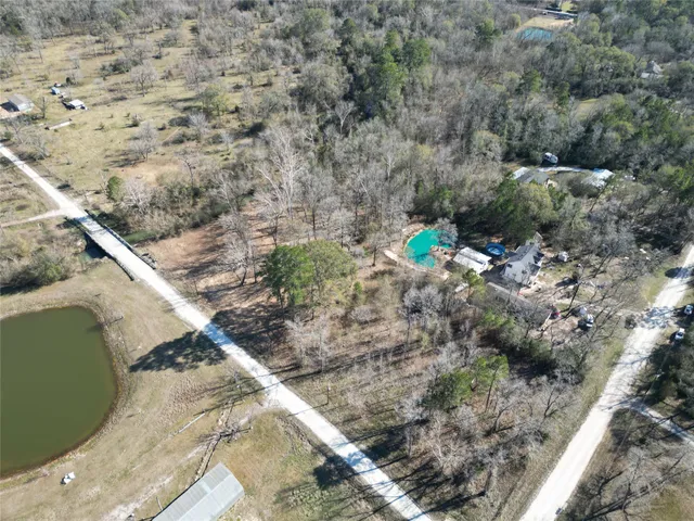 a backyard of a house with a yard and mountain