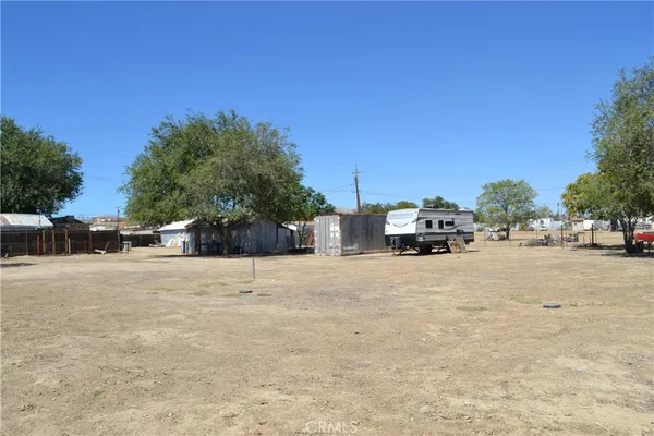a view of car parked on the side of the road