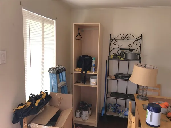a kitchen with a table and chairs