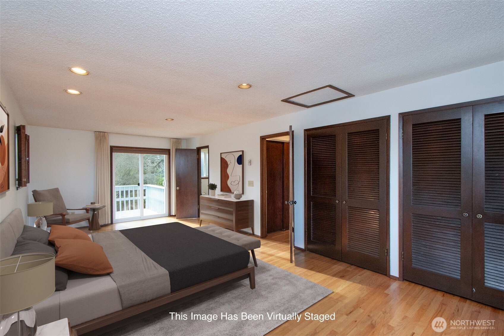 103 Island View Road Port Angeles, WA 98362 - Photo 16 of 40 a bedroom with a large bed and a window