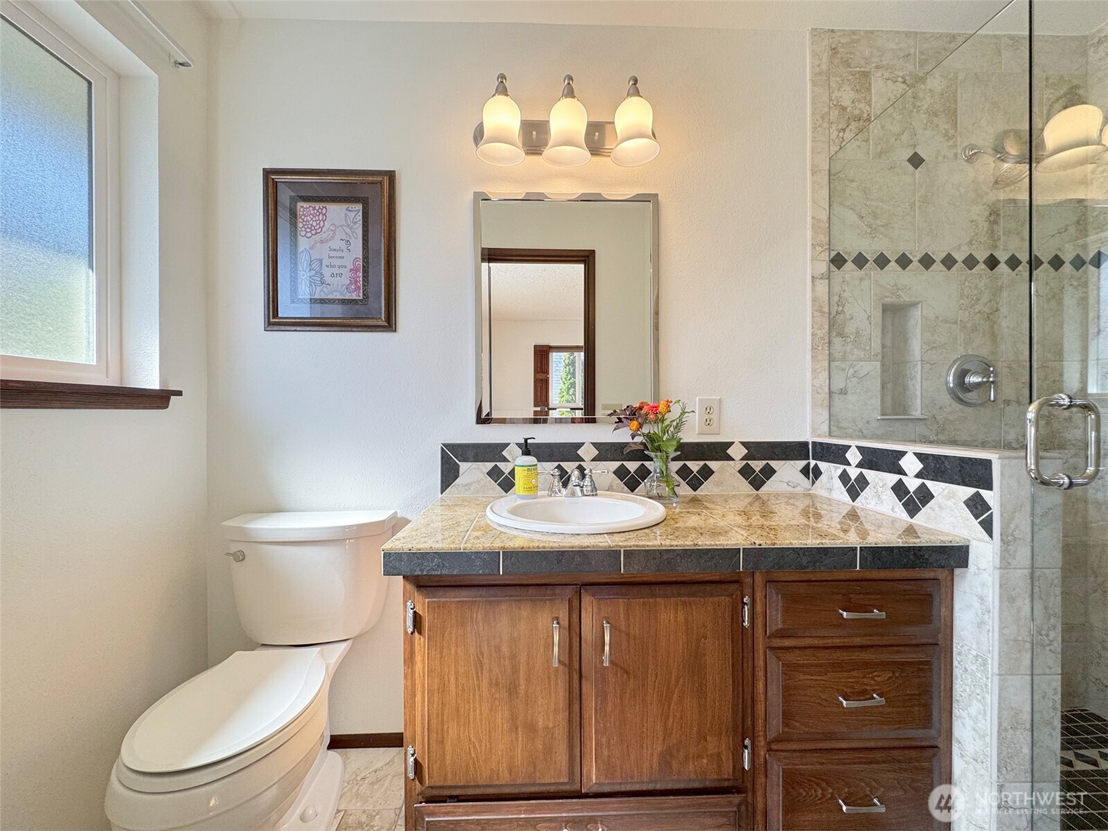 103 Island View Road Port Angeles, WA 98362 - Photo 19 of 40 a bathroom with a toilet sink and mirror
