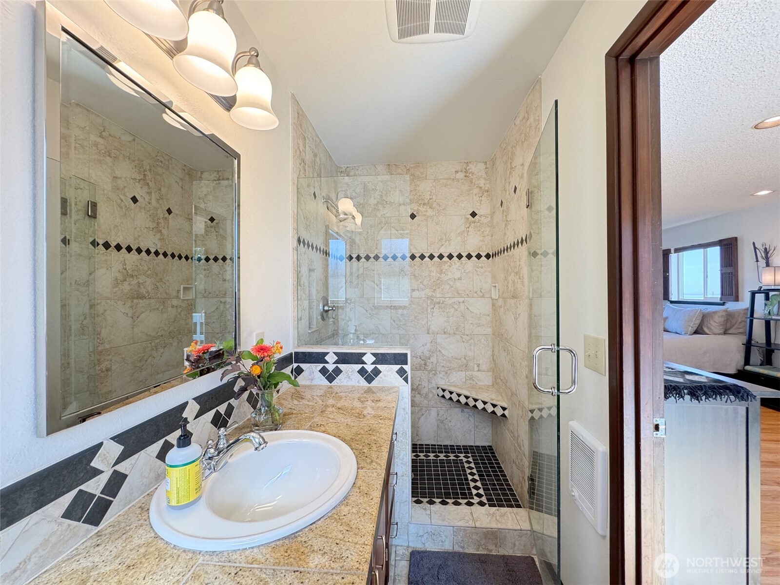 103 Island View Road Port Angeles, WA 98362 - Photo 20 of 40 a bathroom with a sink and a mirror