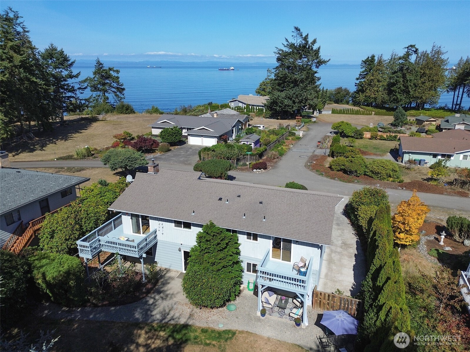 103 Island View Road Port Angeles, WA 98362 - Photo 2 of 40 an aerial view of a house with a garden