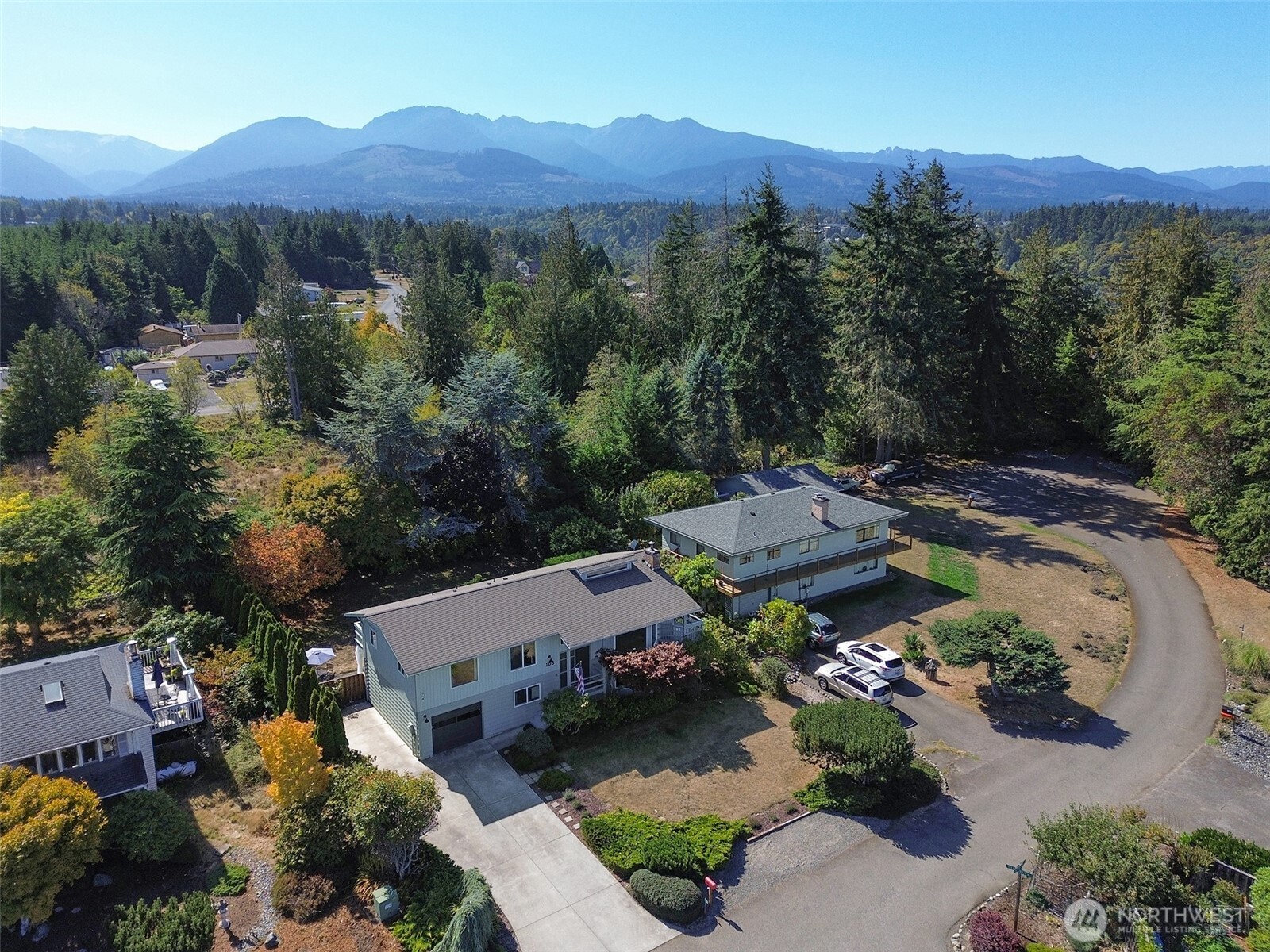 103 Island View Road Port Angeles, WA 98362 - Photo 26 of 40 an aerial view of a house with mountain view