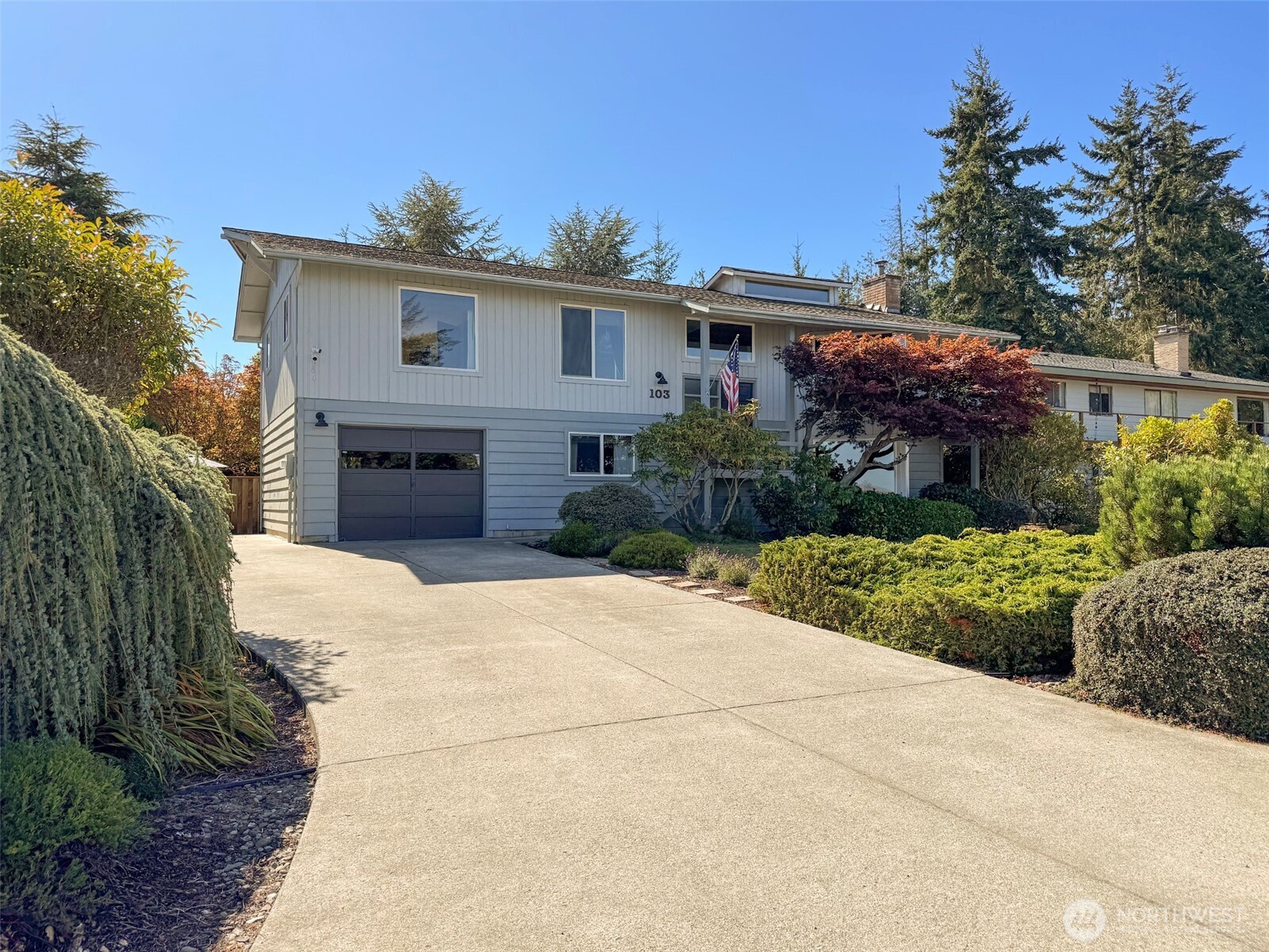 103 Island View Road Port Angeles, WA 98362 - Photo 27 of 40 a front view of house with yard and trees around