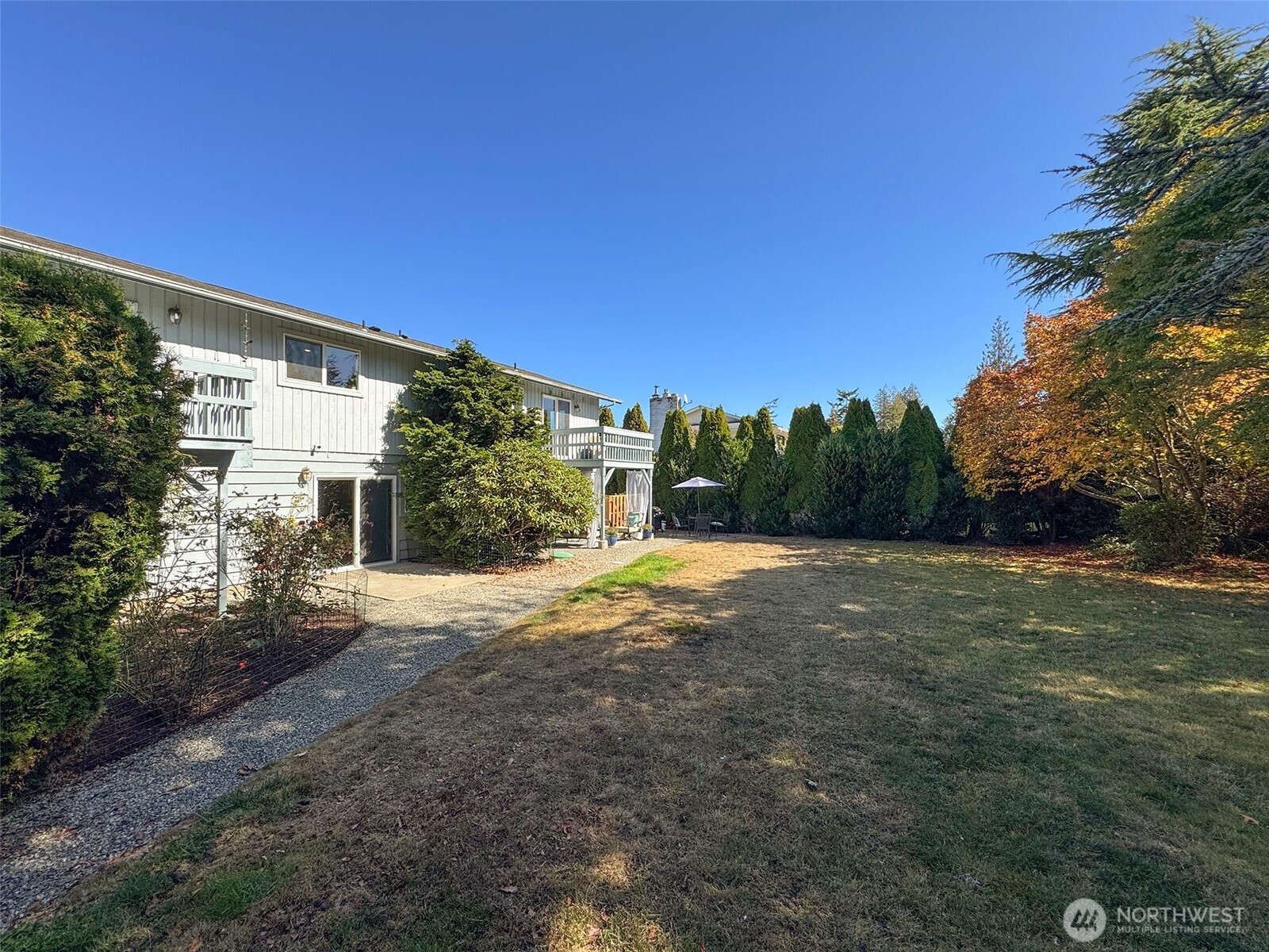 103 Island View Road Port Angeles, WA 98362 - Photo 30 of 40 a view of a house with a yard