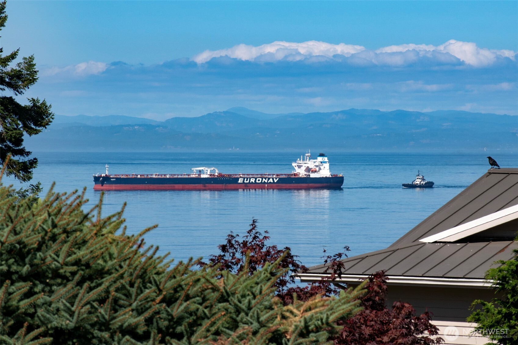 103 Island View Road Port Angeles, WA 98362 - Photo 38 of 40 a view of a lake with a mountain in the background