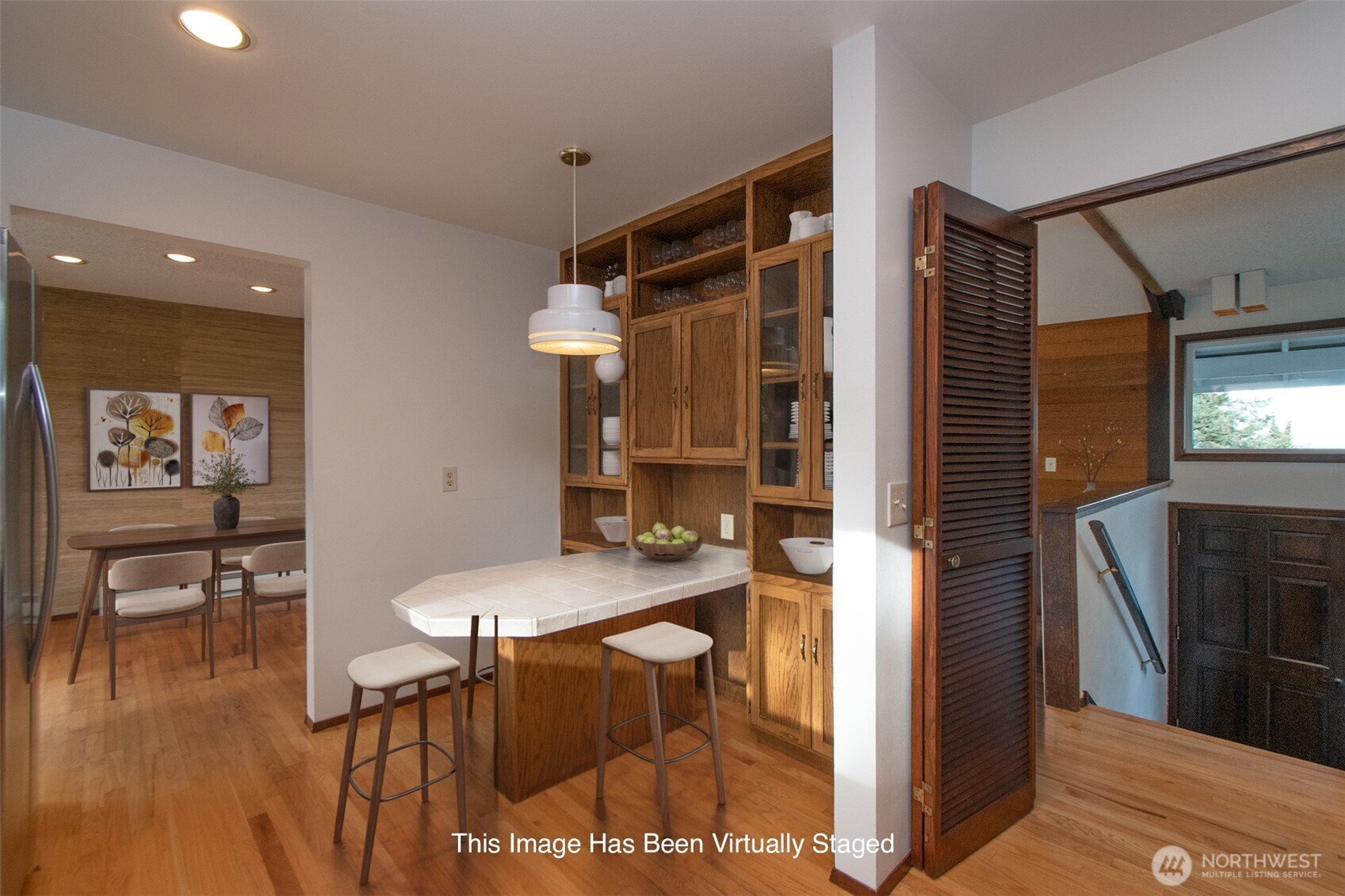 103 Island View Road Port Angeles, WA 98362 - Photo 10 of 40 a view of a dining room with furniture and wooden floor