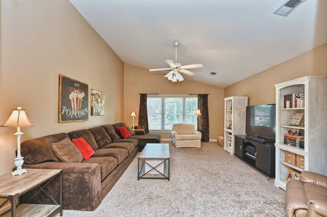 a aerial view of a house with backyard